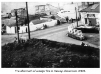 The aftermath of a major fire in Harveys showroom c1970