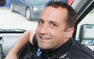  Campaigners claim Sergeant Mike Friday will be wasted if he spends his time behind a desk when he could be making the streets safer in Hayle and nearby St Ives Credit: SWNS 