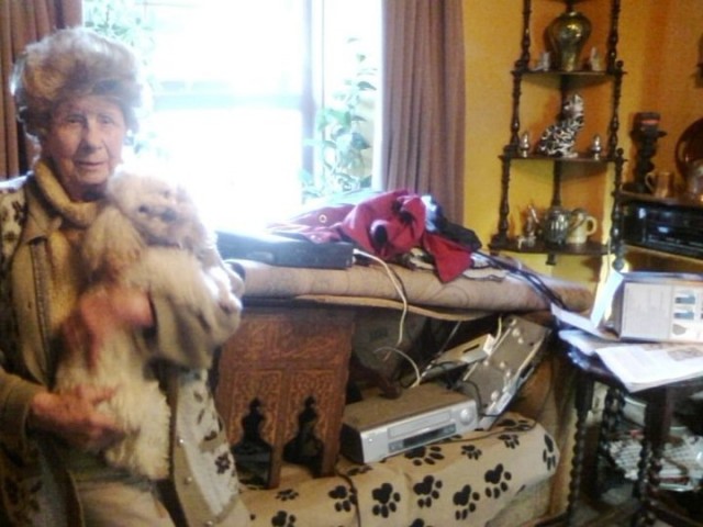One of the flood victims in Angarrack, with her pet poodle